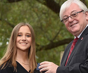 woman smiling outside