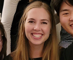 woman smiling with group