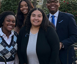 woman smiling with group