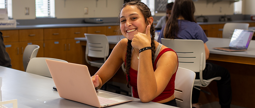 First-year biology students work on laptops in a USC lab classroom.