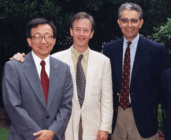 photo of three men in ties