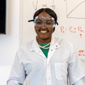 photo of a student in lab coat