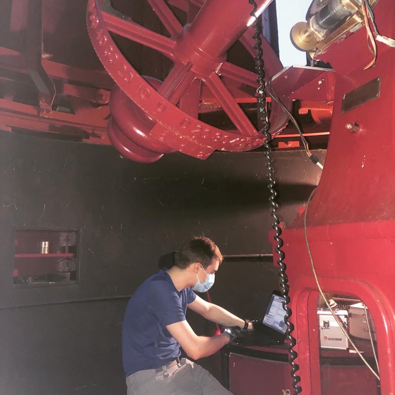 Asher Wood works on a computer in the Melton Observatory.