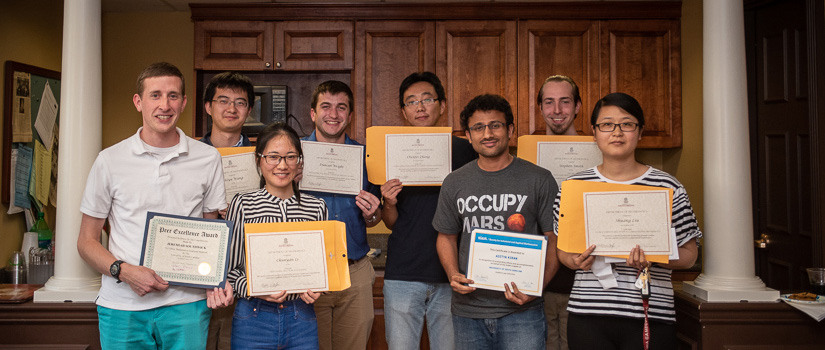 Graduate award winners with their certificates