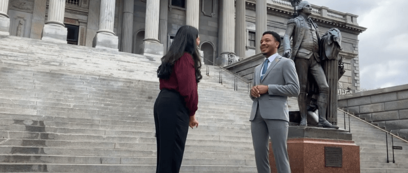 student on SC State House stairs