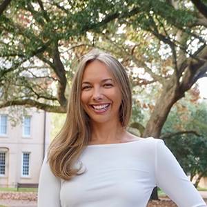 photo of a woman smiling outside