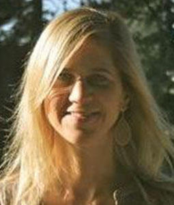 woman with blond hair smiling