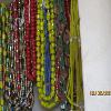 Dozens of strands of colorful African beaded necklaces