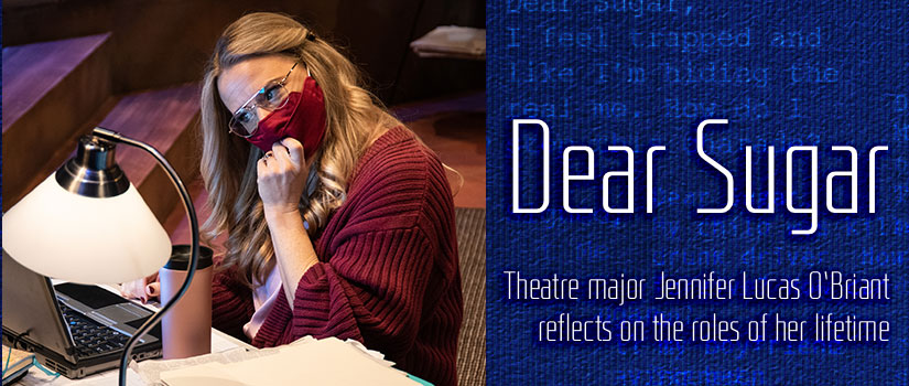 Female actor with hand up to chin, sitting at a desk with a laptop open in front of her, thinking.  The article title "Dear Sugar: Theatre Major Jennifer O'Briant Reflects on the Roles of Her Lifetime."