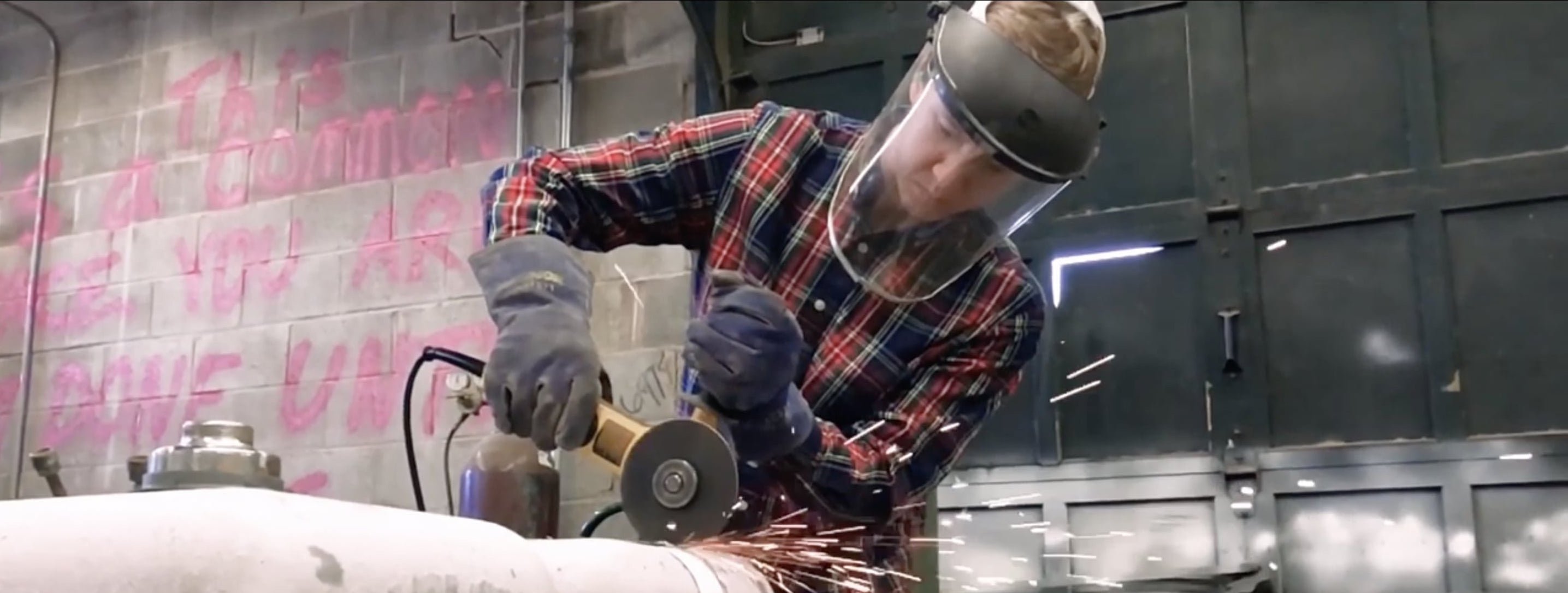 image of student welding