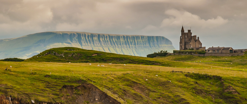 image of irish countryside with a castle