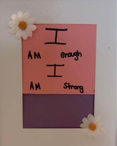 art made by girls in the Juvenile Arbitration program with the words "I am enough I am strong" 