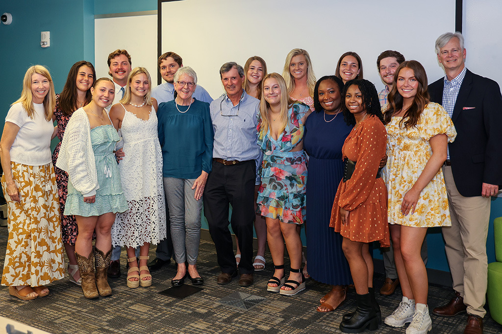 Donor Janet Tarbox attended a celebration with the students who participated in this semester's Carolina Cup photography workshop. The workshop was taught by Renée Ittner-McManus, the winner of this year's SJMC Adjunct Teaching Award. 