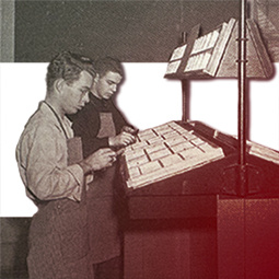 J-school students using printing press