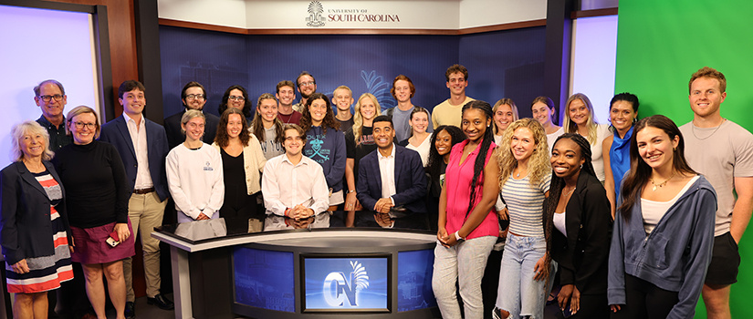 Allen Devlin with Carolina News students