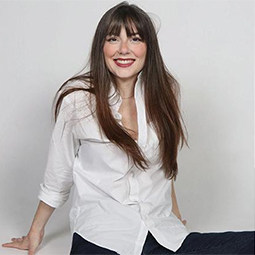 sports photo - track and field female athlete jumping over a bar