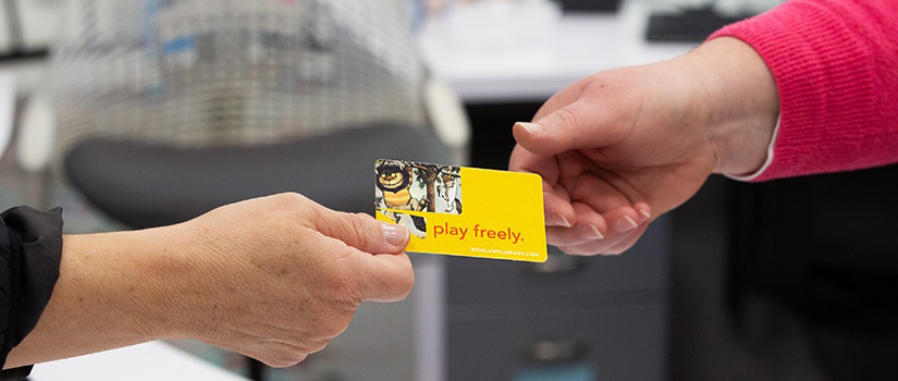 A ticket saying "Play Freely" inside the library