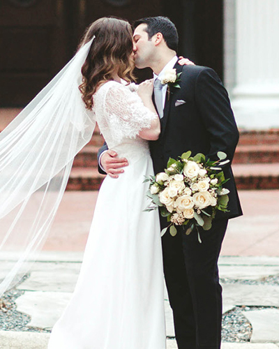 bride and groom kissing