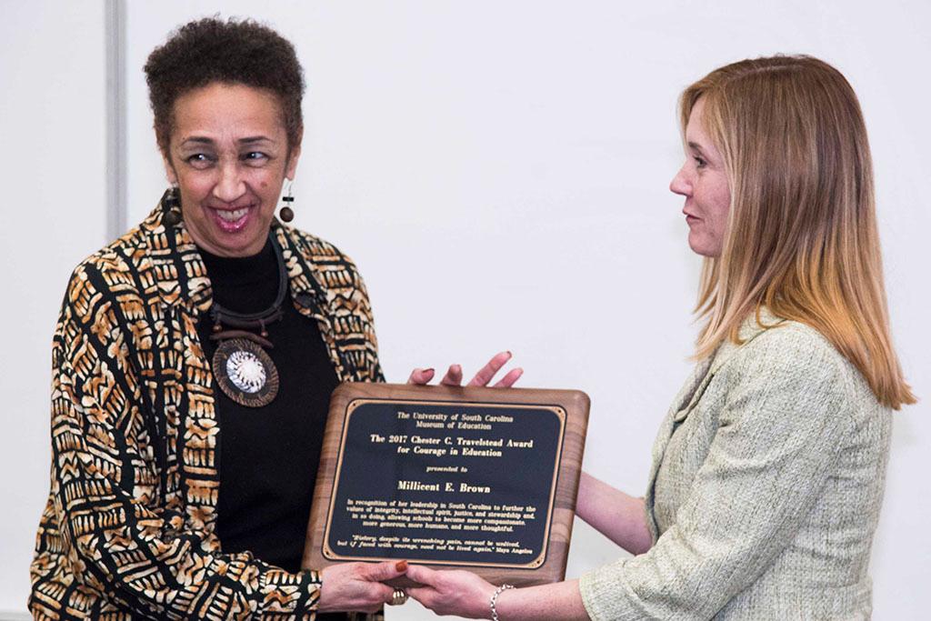 L-r: Millicent E. Brown receiving the Travelstead Award from Monique Travelstead McNamara