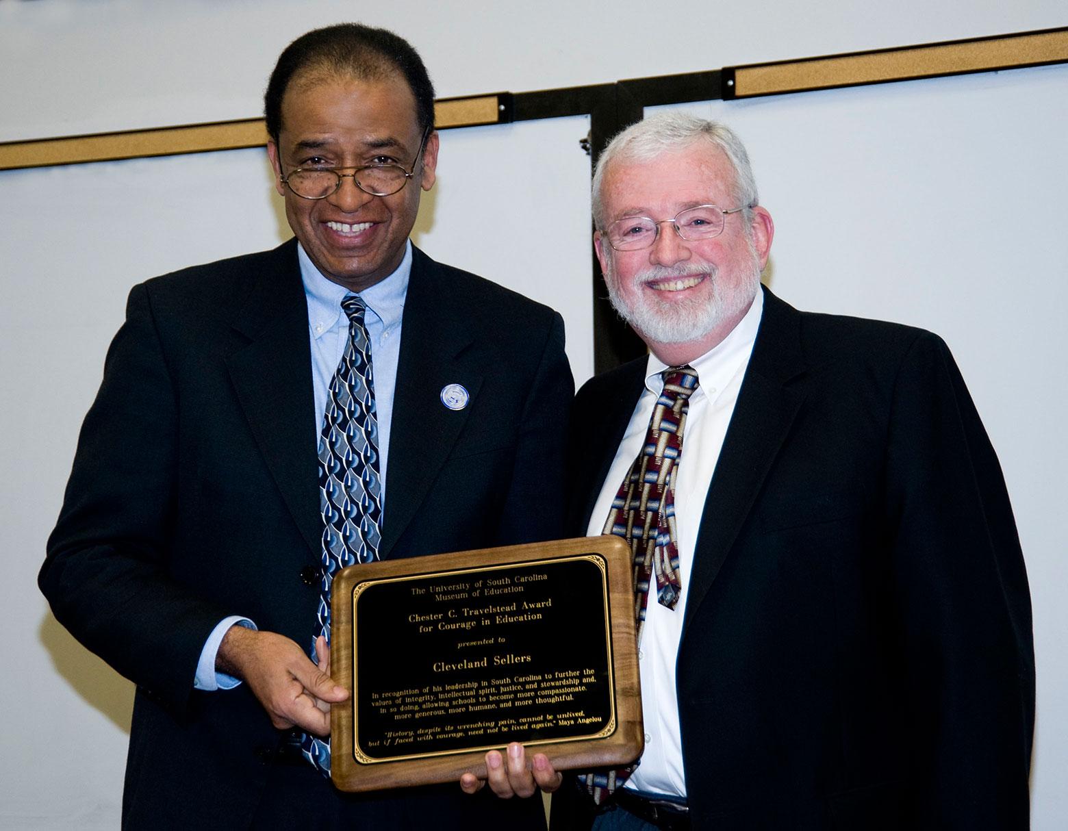 Cleveland L. Sellers Jr. (l) accepting the Travelstead Award for Courage in Education from Coleman Travelstead, the son of Chester C. Travelstead