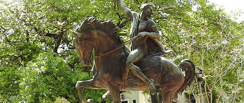 The Torchbearer, a bronze statue of a mounted man bearing a torch