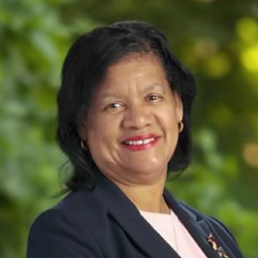 African American woman in a suit.