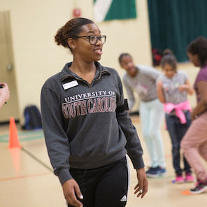 An African American female physical education teacher
