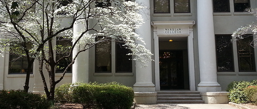 Front entrance of Wardlaw College. A flowering tree is visible on the left.