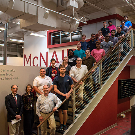 MJF members stand on McNair's stairs.