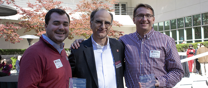 eric hatch, dean hosserin haj-hariri, and wayne vermullen pose with their awards at the event