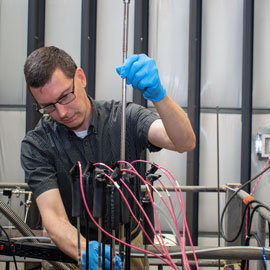 Travis Knight working in lab