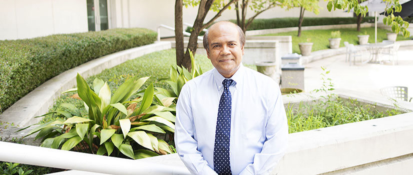 Professor and new Electrical Engineering Chair Mohammod Ali in the College's courtyard 