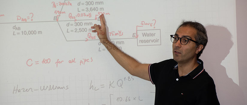 Melilh Calamak teaching a water resources engineering course.
