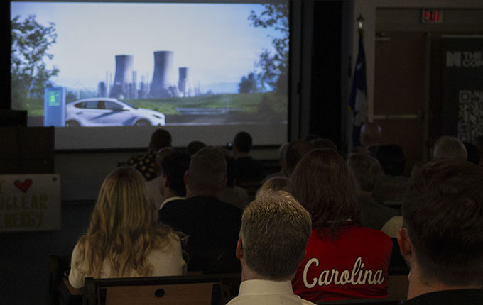 Members of the Molinaroli College of Engineering and Computing community watching the documentary, "The Nuclear Frontier."