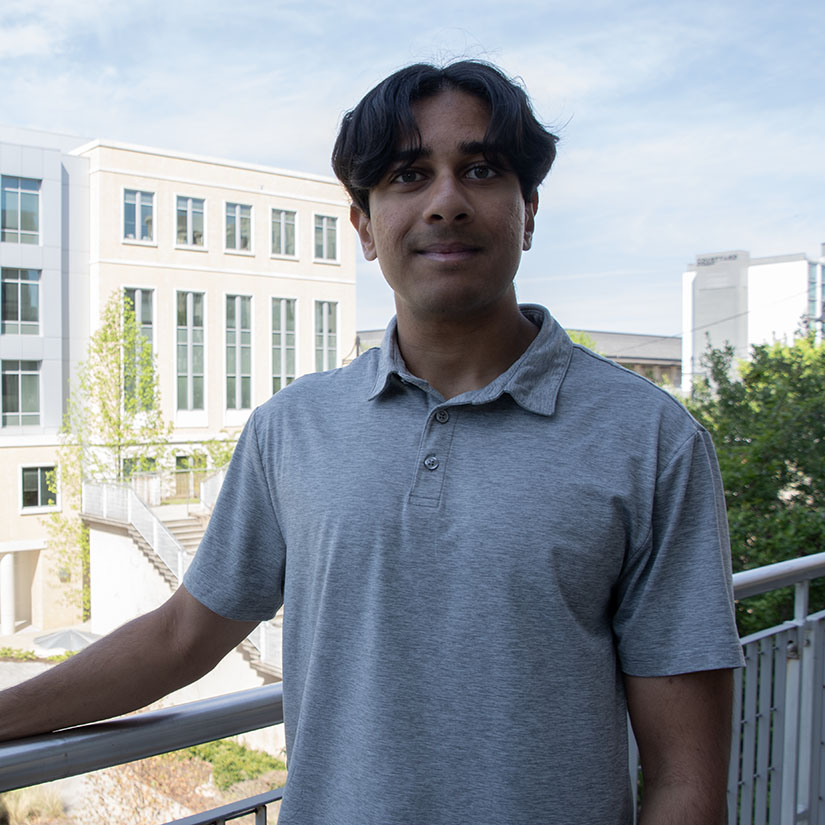 Abhinav Krishniah standing with the Storey Building in the background.