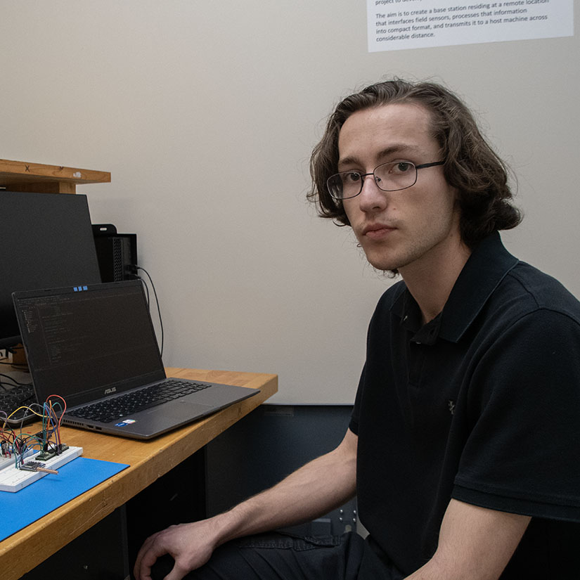 Nathan Shute in an electrical engineering lab.