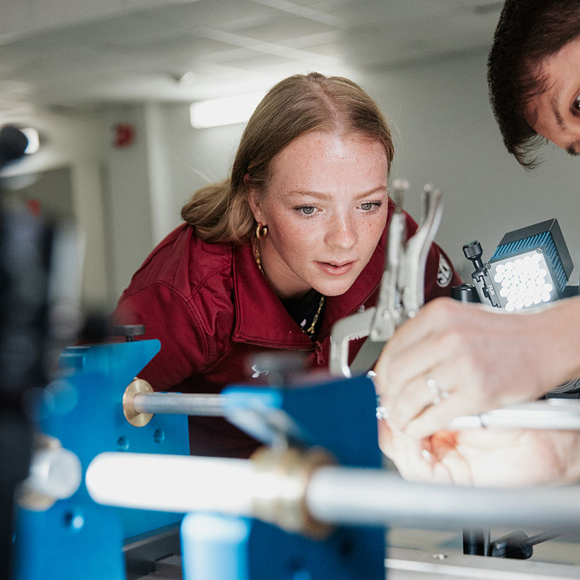 Ruby Voortmeyer in a mechanical engineering lab. 