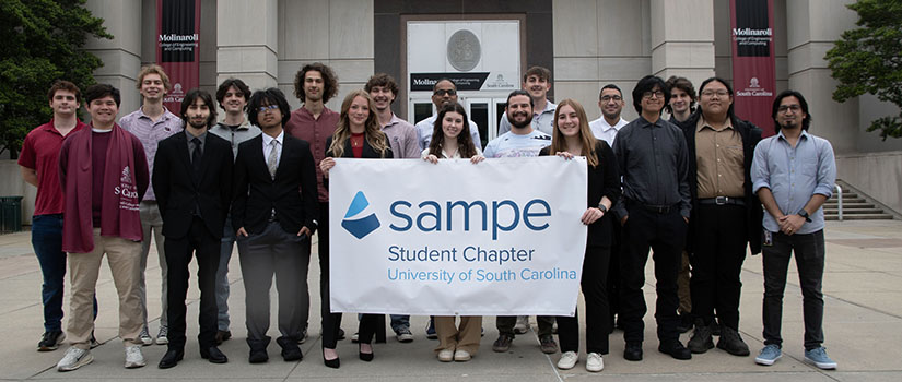 SAMPE group members in front of the entrance to the Swearingen Engineering Center. 