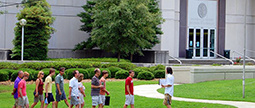 People on a CEC tour outside of the Swearingen Center