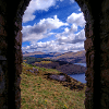 “Window to the Highlands" in Scotland by Alessandro Berloffa "This picture was taken from atop Dun na Cuaiche which overlooks the town of Inveraray. At the top of the hill sits a stone monument which is little more than a small room in which I took this picture."