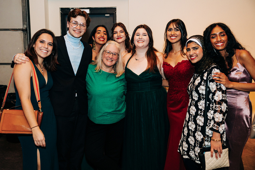 Jan Smoak with a group of Top Scholars at their spring formal.