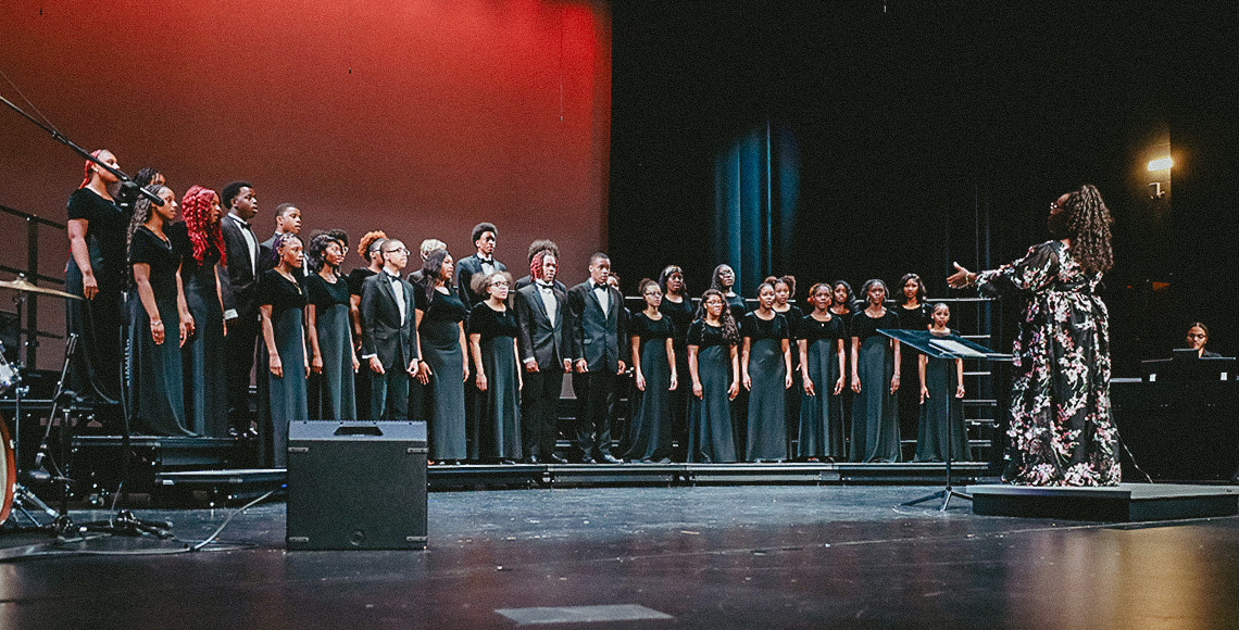 Woman conducting musical performance