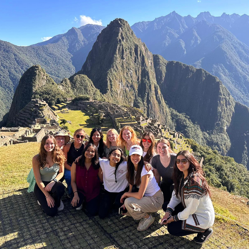 Kayla Davenport with a group of volunteers in Machu Pechu, Peru.
