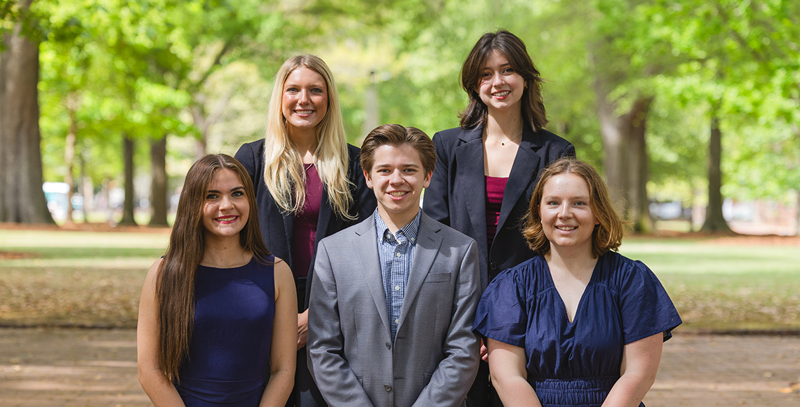 Group of students in business attire.