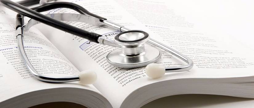 Medical text and stethoscope