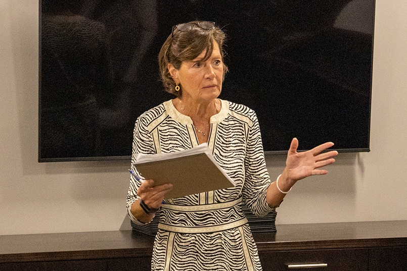 Senior instructor Susan O'Malley speaks to students in her sports law class.
