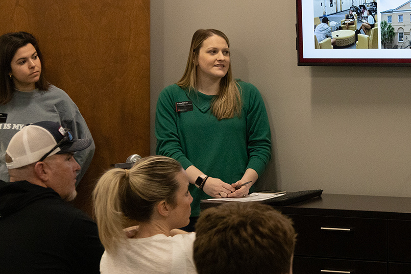 Laura Nix Bishop gives a presentation to a group of prospective HRSM students in the welcome center on the first floor of Close-Hipp.