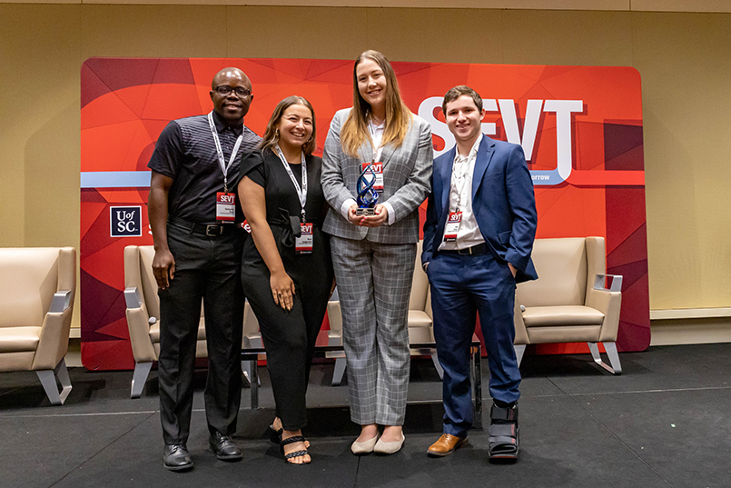 Sport management majors Kemardo Tyrell, Rose Spagnuolo, Madelin McLean and Max Orsini won first place in the SEVT Case Cup Competition at the Sport Entertainment and Venues Tomorrow conference over Nov. 16-18, 2022, at the Columbia Metropolitan Convention Center.