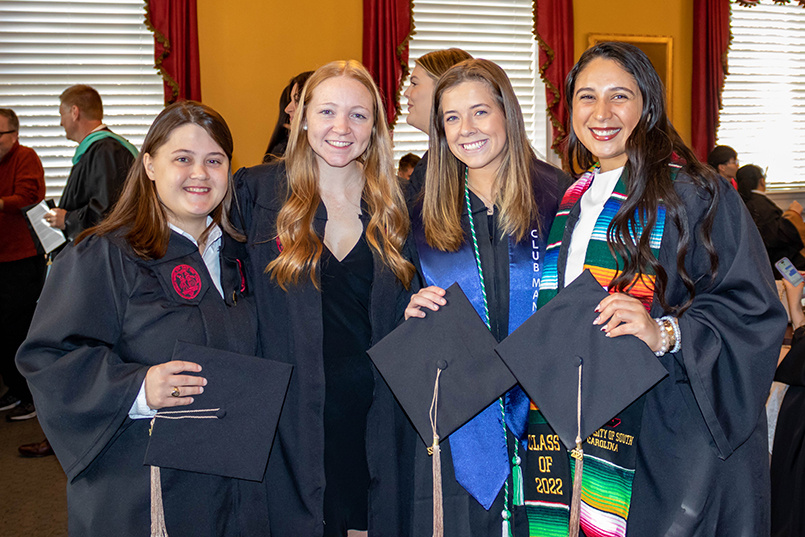 HRSM hosted the annual Hooding and Cording ceremony Monday, Dec. 12, 2022, celebrating December graduates who earned master's degrees, completed undergraduate degrees with honors and/or served in the HRSM Leadership Program.