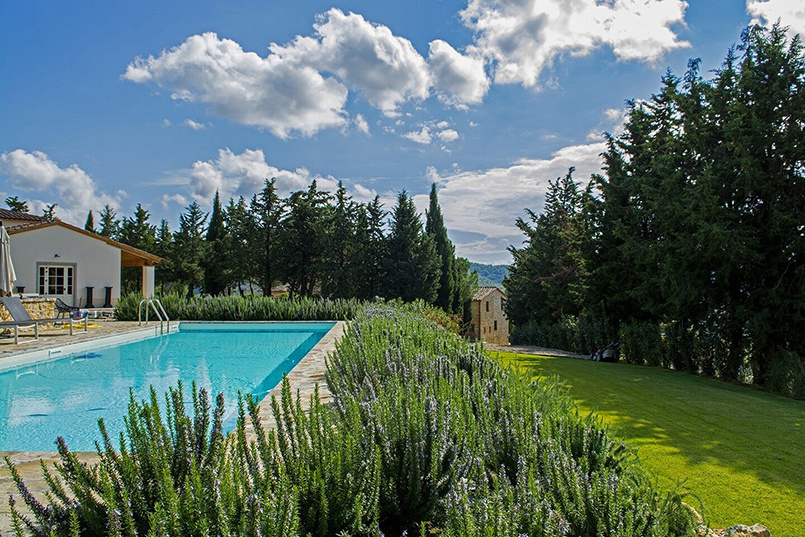 An outdoor pool at a villa in Tuscany